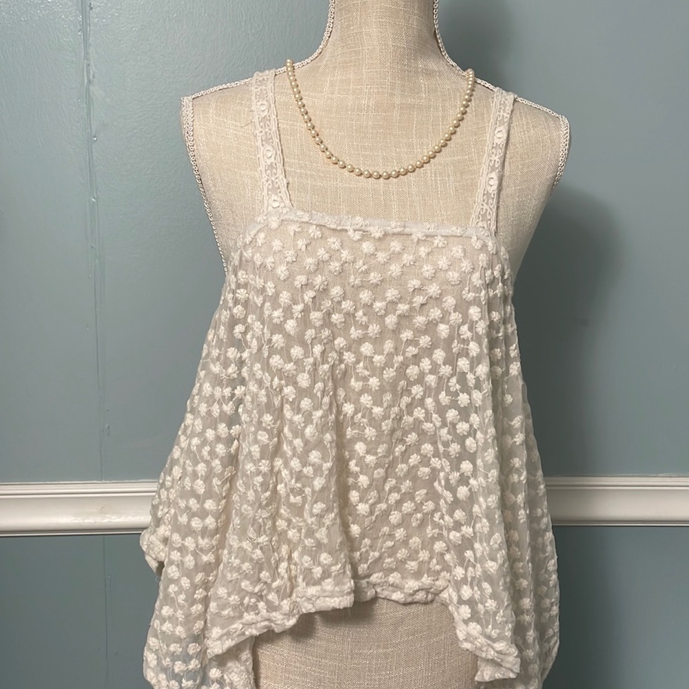 Size small, sheer Rue 21 tank top, crocheted flowers, cream colored